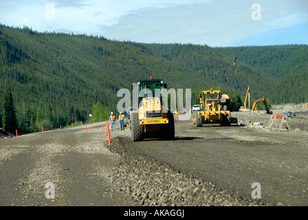 Road Construction Resurfacing Resurface Gravel Heavy Equipment Grade Alaska Highway ALCAN Al Can British Columbia B C Canada Stock Photo