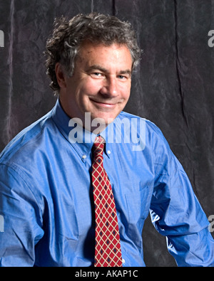 A middle aged business man in corporate attire Stock Photo