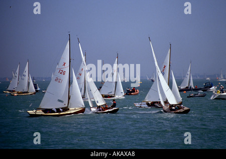 Yachts racing outside Cowes during Cowes Race week Solent Hampshire England Stock Photo