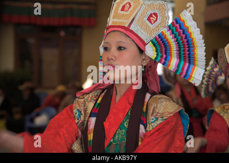 Nepal, Kathmandu, Bodhnath Buddhist stupa, Lhosar Tibetan & Sherpa New Year festival, Tibetan woman dancing Stock Photo