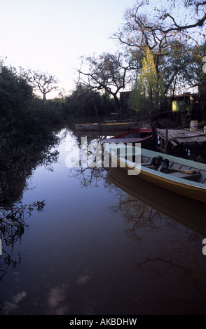 Water stream-canal with boats late afternoon Stock Photo