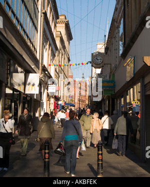 People walking up Exchange Walk towrds Market Square in Nottingham City Centre, Nottinghamshire UK Stock Photo