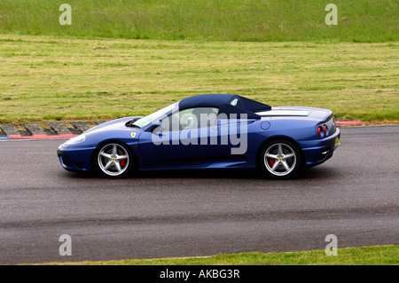 Ferrari 360 spider, a convertible variant of the Modena, a pedigree Sports car, with a top speed of 180mph. New Pininfarina body Stock Photo