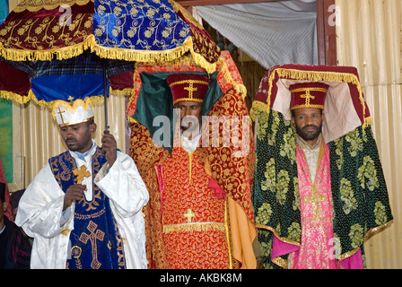 Ethiopian Orthodox Clergy carrying 'Tabots' and an umbrella at the feast of Timkat (Epiphany), Addis Abeba, Ethiopia Stock Photo