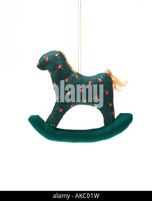 Christmas ornament rocking horse hanging on hook Stock Photo