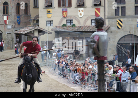 Contestant in Arezzo s Giostra del Saraceno strains against the