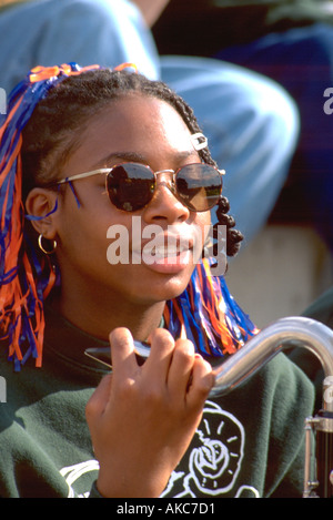 Musician age 20 at Macalester football game. St Paul Minnesota USA Stock Photo