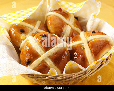 Traditional English hot cross buns in a basket vegetarian editorial food Stock Photo