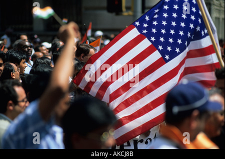 Americans and Indians carry flags during a parade on 5th Avenue near the Indian leaders in New York City. © Craig M. Eisenberg Stock Photo