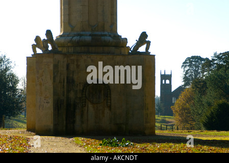 The base of the Cobham Monument, Stowe Landscape Gardens, Buckinghamshire, England, with the Gothic Temple in the background Stock Photo