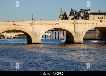 Pont Neuf bridge on Seine river Paris France the oldest bridge of Paris and Pont au Change bridge back Stock Photo