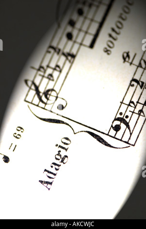 A Stock Photograph of musical notes on a piece of paper representing lifestyle and arts Stock Photo