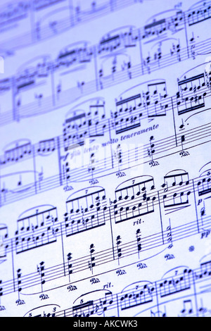 A Stock Photograph of musical notes on a piece of paper representing lifestyle and arts Stock Photo