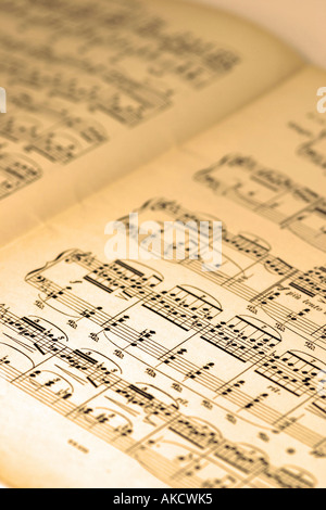 A Stock Photograph of musical notes on a piece of paper representing lifestyle and arts Stock Photo