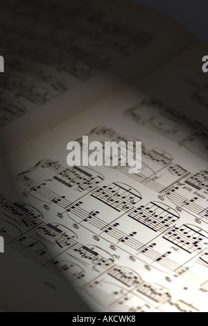 A Stock Photograph of musical notes on a piece of paper representing lifestyle and arts Stock Photo