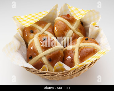 Traditional English hot cross buns in a basket vegetarian editorial food Stock Photo