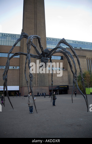 Huge spider sculpture entitled Maman by Louise Bourgeois outside Tate Modern London Stock Photo