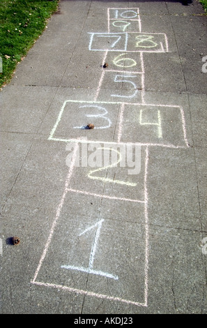 Hopscotch game drawn on sidewalk in chalk Stock Photo