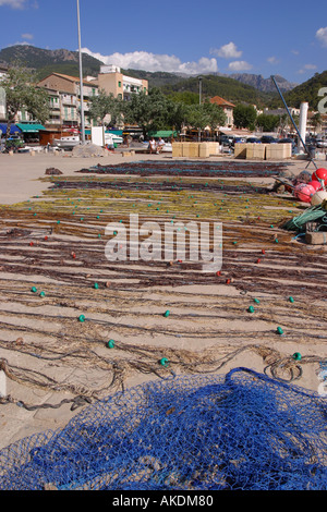 Port De Soller Majorca Fishing nets laid out to dry on the quayside Stock Photo
