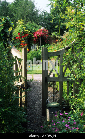 Wollerton Old Hall Shropshire wooden gate leading into garden room Stock Photo