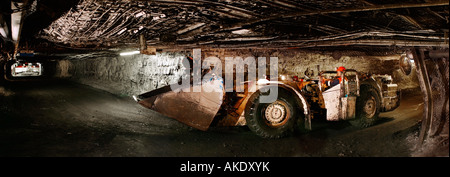 Person in unconventional car in tunnel, side view Stock Photo