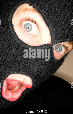 A stock photograph of an attractive woman wearing a balaclava. Stock Photo