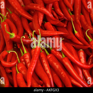 Red chillies fill a display at a market stall. Picture by Jim Holden. Stock Photo