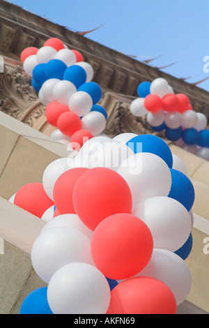red white and blue balloons adorn Birmingham Town Hall during celebrations for the 60th anniversary of VE Day Stock Photo