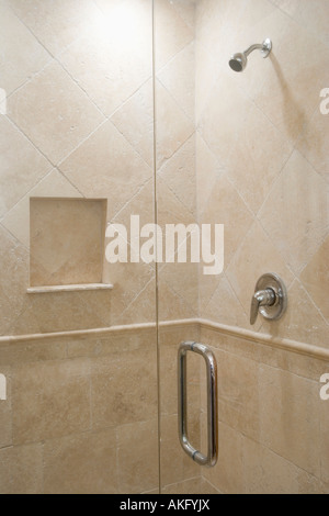 Detail of stone shower with glass door Stock Photo