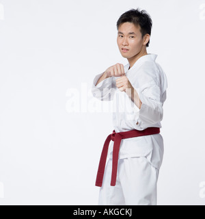 Young man in fighting stance Stock Photo