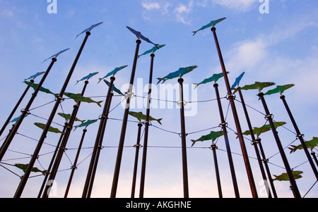 Sculpture of fish on poles an art feature at the start of the Trans Pennine  Trail in Southport Lancashire England UK Stock Photo - Alamy