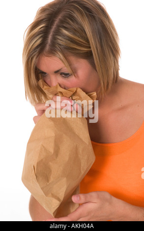Hyperventilating Caucasian Teen Girl Breathes Into Paper Bag Usa Stock Photo Alamy