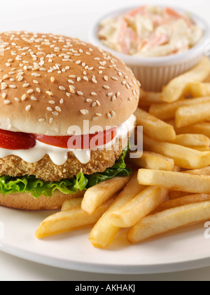 chicken burger French fries chips coleslaw editorial junk food Stock Photo