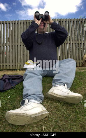 Plane spotter at Luton airport UK Stock Photo