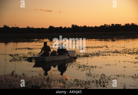 Fishermen at sunset on Lake Kariba, Zimbabwe, Africa Stock Photo