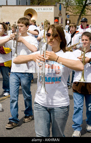 High school band marching in parade. MayDay Parade and Festival. Minneapolis Minnesota USA Stock Photo