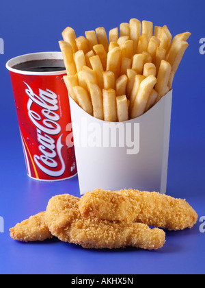 breaded chicken strips French fries coke editorial junk food Stock Photo