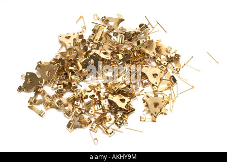 A mixture of 'picture hooks' hangers and pins Stock Photo