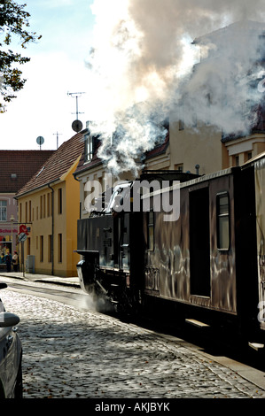 The 'Molli' steam train in the streets of Bad Doberan in Northern Germany. Stock Photo