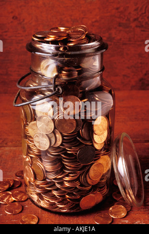 Jar full of pennies Stock Photo