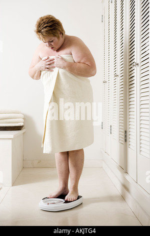 Obese Woman Standing Analog Bathroom Scale View Stock Photo by