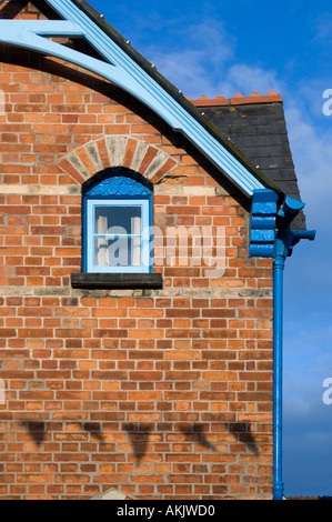 In the centre of Padstow Cornwall are these beautiful redbrick Victorian almshouses Stock Photo