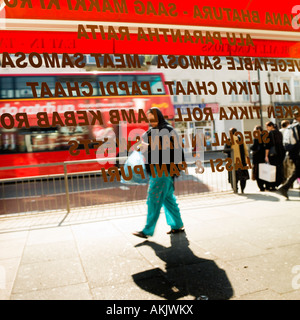 high street retail Southall West London. No model release required, crop, distance means no one in shot is recognizable Stock Photo