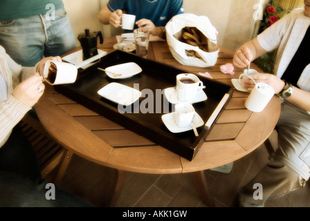 Group of friends having breakfast together