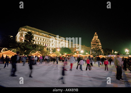 Nice Cote dAzur France - Skaters enjoying the artificial ice rink at the annual Christmas market Stock Photo