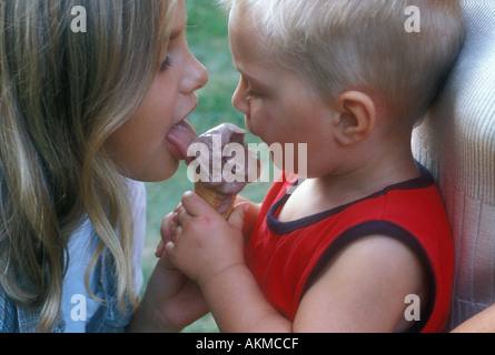 Licking Ice Cream Cone Stock Photo