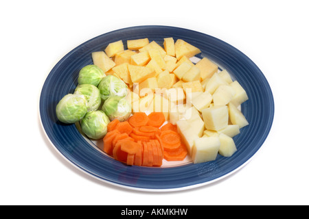 Mixed uncooked vegetables on a plate Stock Photo