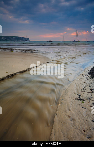 Stream leading out into Swanage bay, Dorset Stock Photo