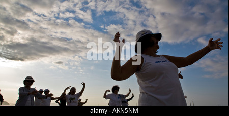 Tai chi chuan class at Copacabana beach in the morning Rio de Janeiro Brazil Stock Photo