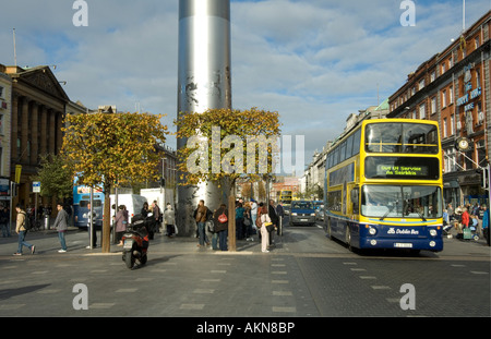 A bus passes the base of the Spire on O'Connell Street Dublin Ireland Stock Photo